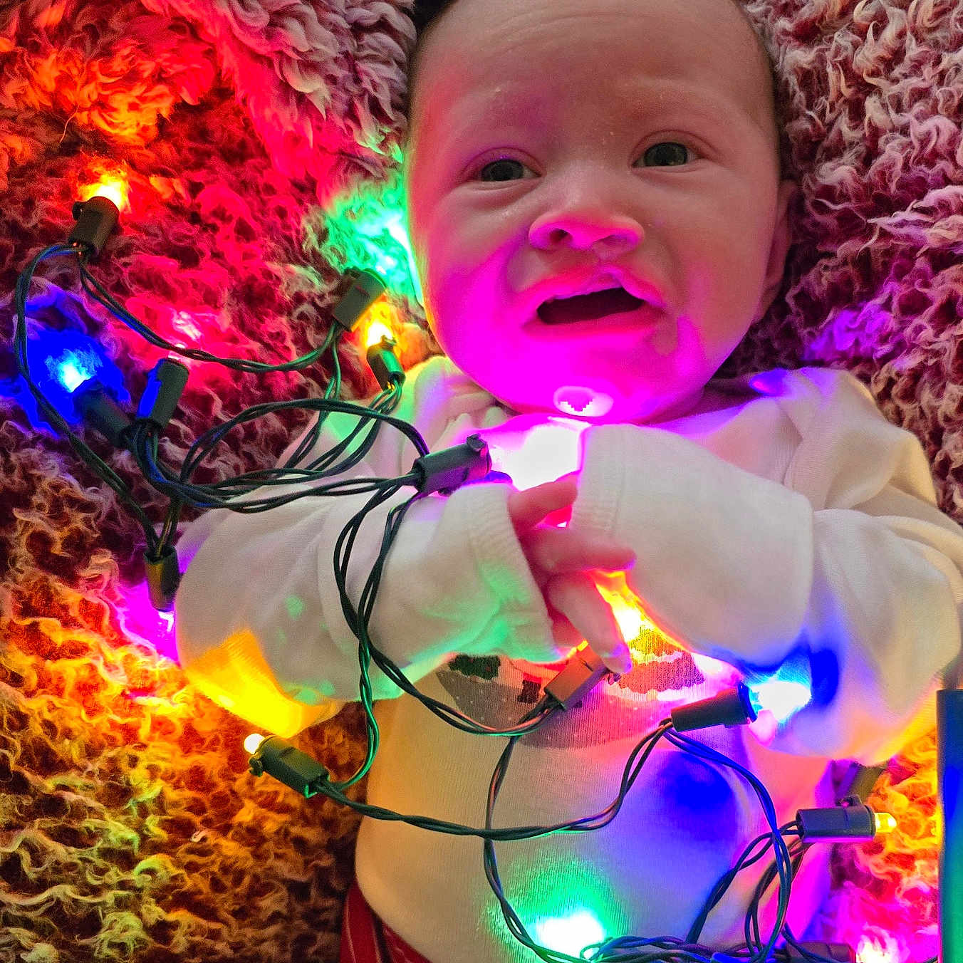 Aubree is registered to the contest to win money with this photo: accessories, baby, bodypart, electricaldevice, electronics, face, finger, hand, head, led, light, lighting, microphone, neon, pattern, person, photography, portrait, purple, sphere
