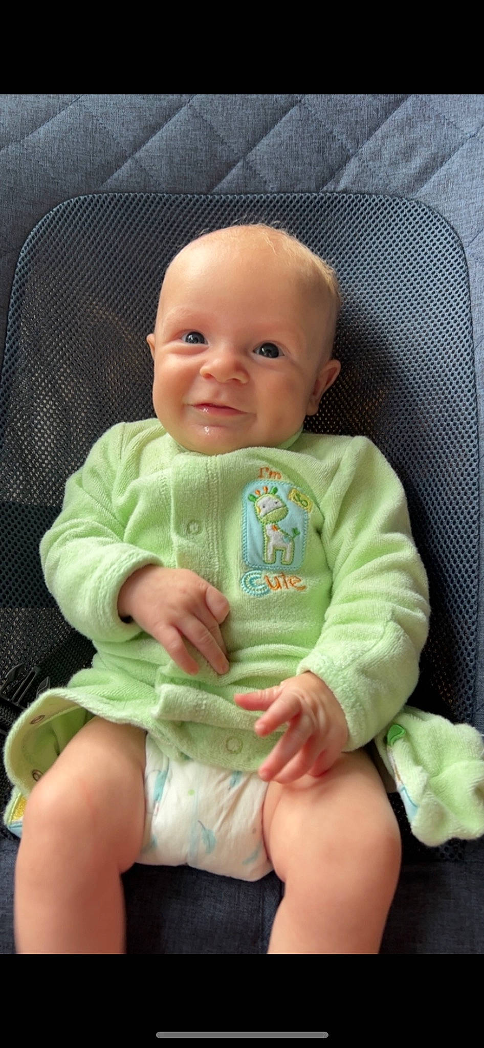 Cohen is registered to the contest to win money with this photo: baby, baby_products, baby_safety, baby_toddler_clothing, chair, cheek, child, comfort, eye, knee, lap, linens, person, product, sitting, skin, sleeve, sock, thigh, thumb