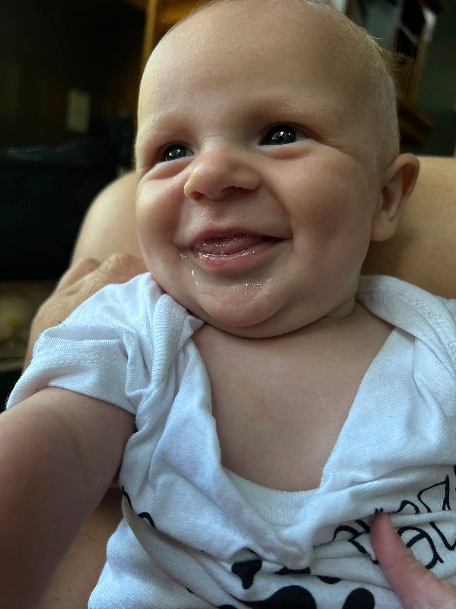 Cohen is registered to the contest to win money with this photo: baby, baby_laughing, baby_toddler_clothing, cheek, chin, comfort, eyebrow, fun, gesture, grass, happy, iris, joy, lip, mouth, nose, person, skin, sleeve, smile