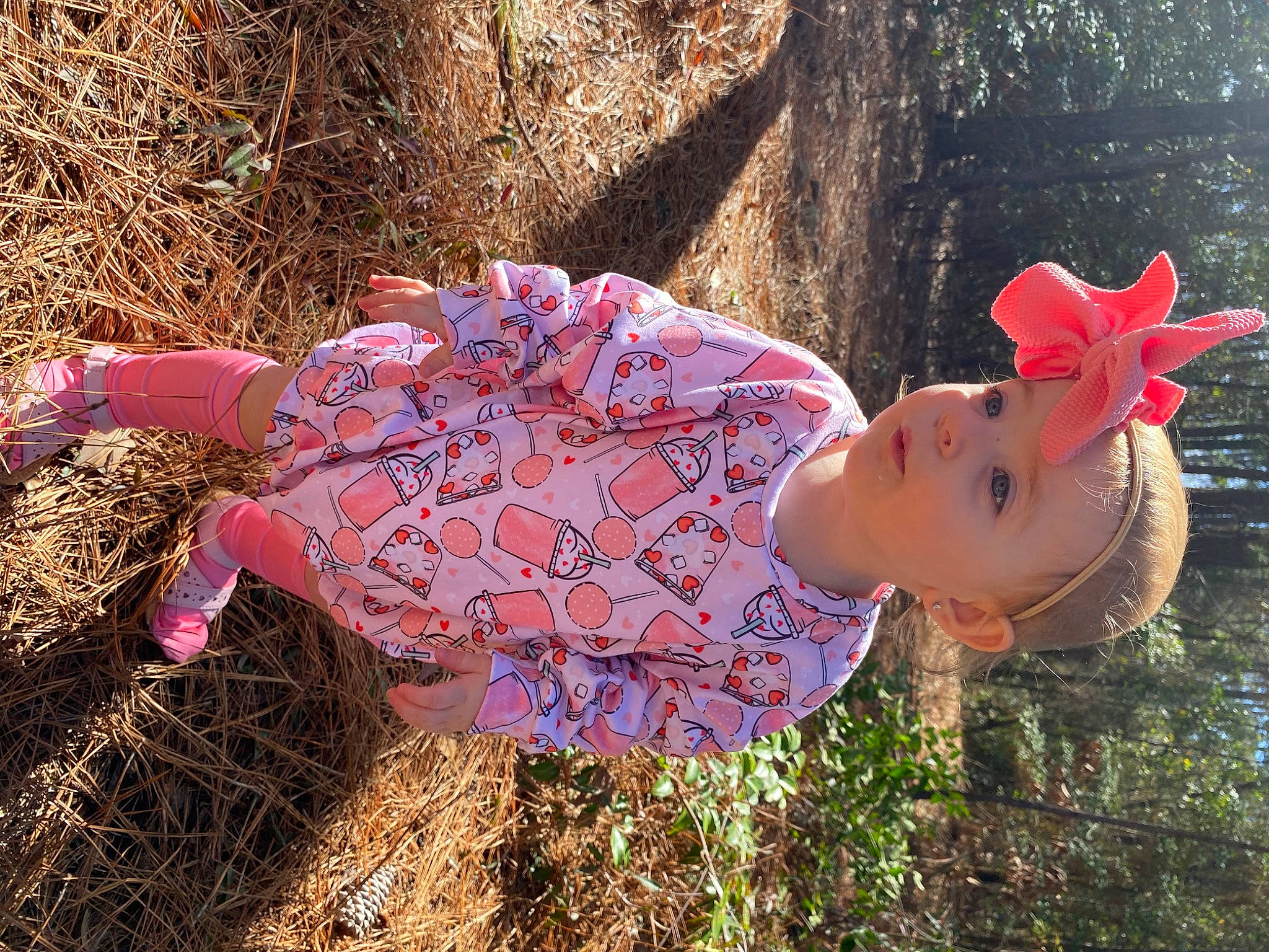 Kinsley is registered to the contest to win money with this photo: baby, baby_toddler_clothing, carmine, child, fashion_accessory, fun, grass, grass_family, happy, hat, headwear, leaf, magenta, organism, pattern, people_in_nature, person, pink, plant, sun_hat