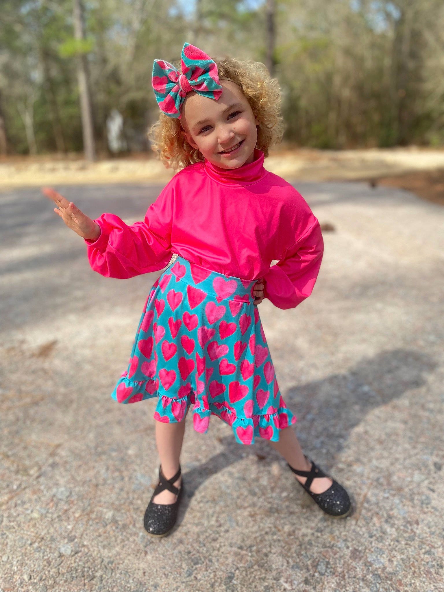 Isabelle Nicole is registered to the contest to win money with this photo: baby_toddler_clothing, dress, electric_blue, eye, face, footwear, grass, happy, head, headwear, joy, magenta, outerwear, pattern, people_in_nature, person, pink, plant, sleeve, smile