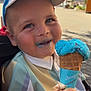 Ilyan participe au concours pour gagner de l'argent avec cette photo : blue_ice_cream, cap, child, clothing, cone, daytime, face, food, hand, happy, hat, ice_cream, outdoor, smiling, street, summer, sunny, sweet, toddler, urban