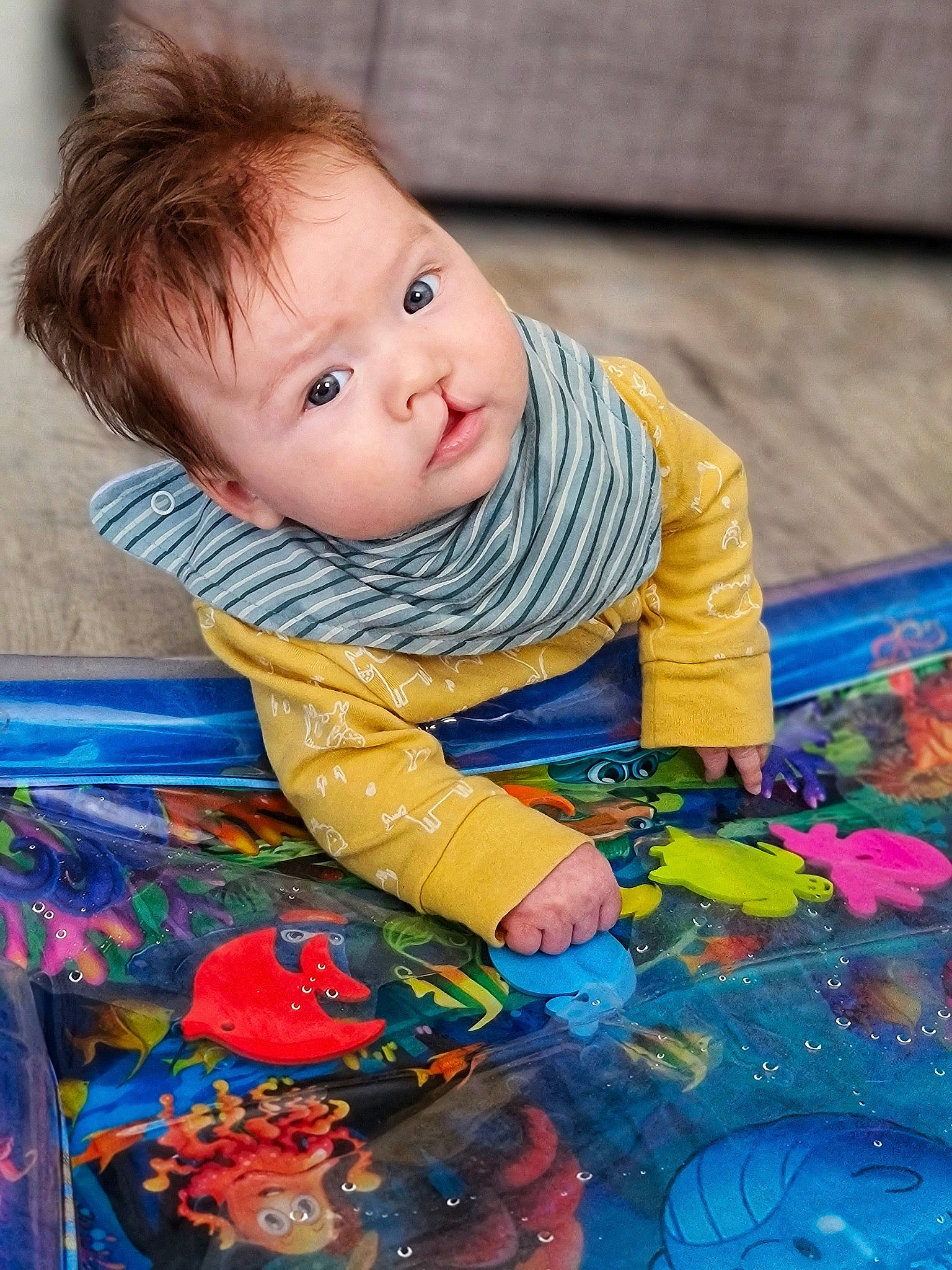 Thomas joined the competition — help win amazing prizes! baby, baby_products, baby_toddler_clothing, cheek, child, electric_blue, flooring, fun, grass, happy, head, iris, nose, paint, person, plastic, play, sitting, toddler, visual_arts