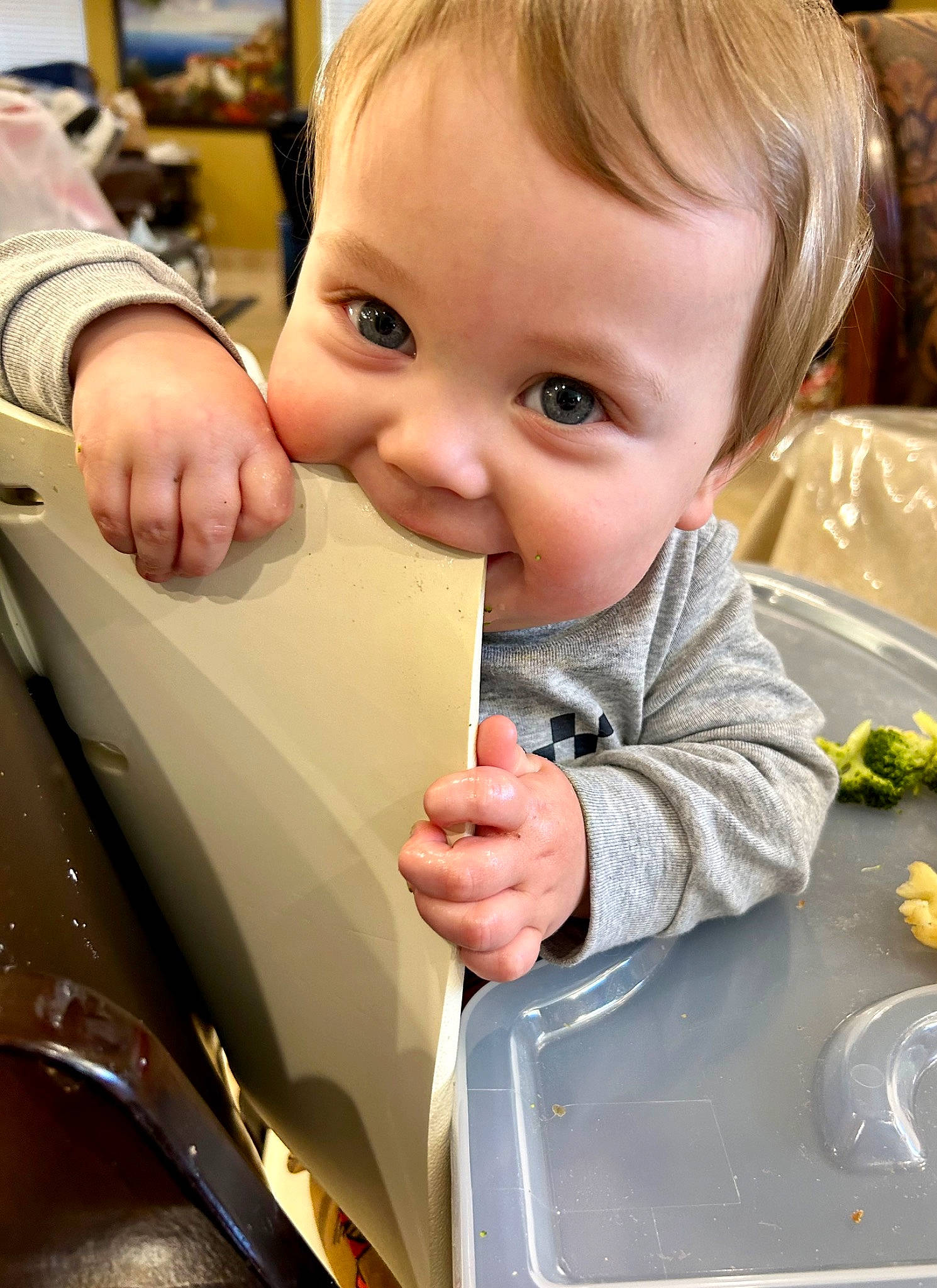 Dom is registered to the contest to win money with this photo: baby, baby_toddler_clothing, cheek, child, comfort_food, drinkware, eyelash, finger, gesture, happy, iris, nail, nose, person, play, sitting, smile, tableware, thumb, toddler