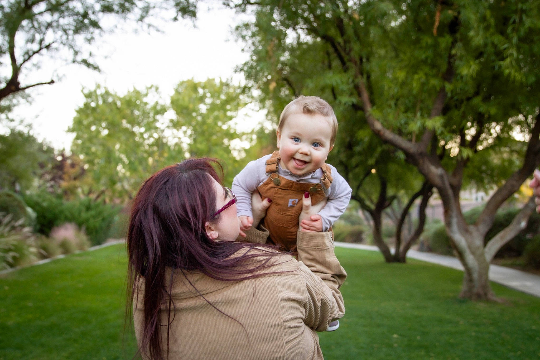 Dom is registered to the contest to win money with this photo: baby, botany, child, event, flash_photography, fun, gesture, grass, happy, joy, lawn, leaf, leisure, mammal, people_in_nature, person, plant, recreation, sky, smile