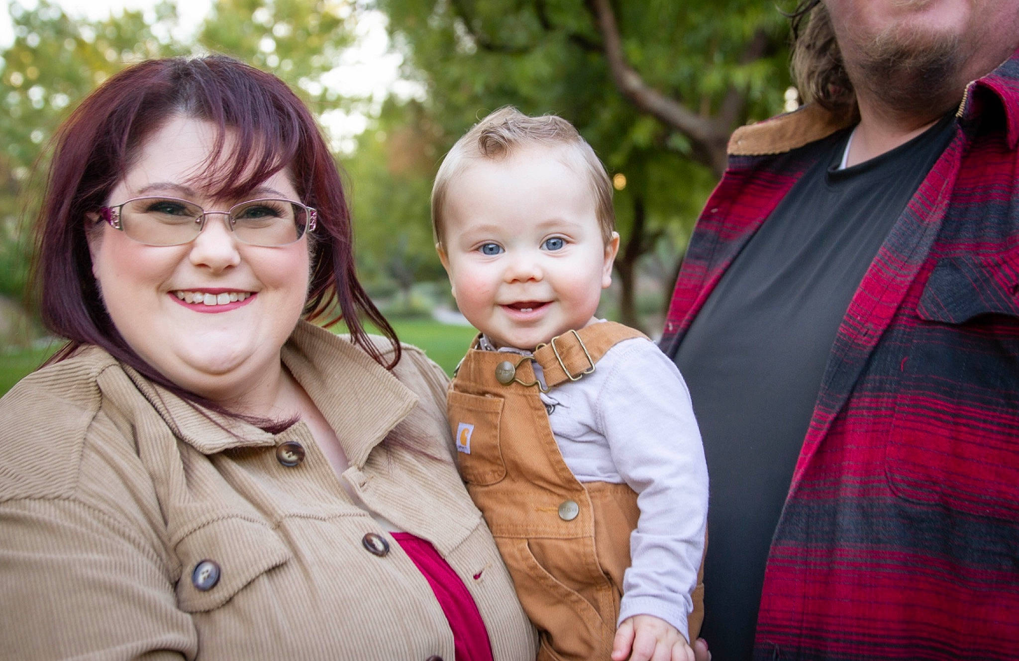 Dominic is registered to the contest to win money with this photo: baby, beard, child, event, eyewear, family_taking_photos_together, fun, gesture, grass, happy, iris, jewellery, joy, people_in_nature, person, plaid, red, skin, smile, tartan