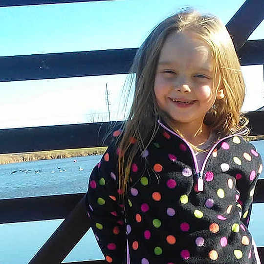 Kayden is registered to the contest to win money with this photo: child, design, fun, hair, happy, joy, leisure, outerwear, pattern, person, photography, smile, toddler, travel, vacation