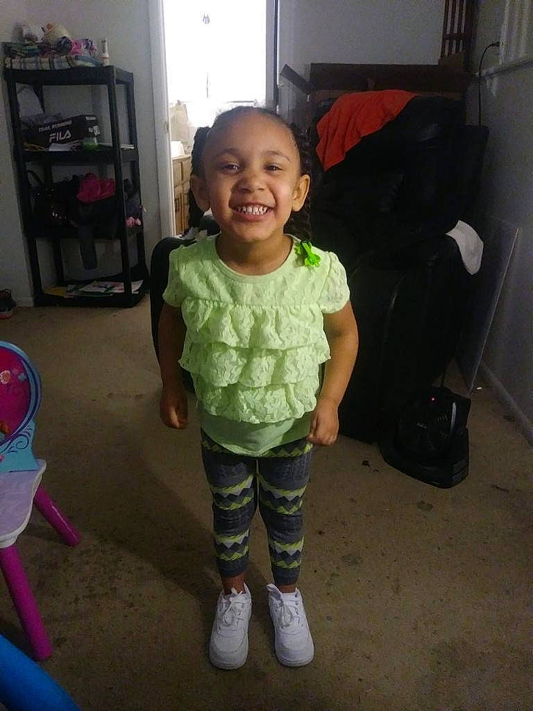 Asia is registered to the contest to win money with this photo: ankle, baby_products, baby_toddler_clothing, baggage, child, floor, flooring, joy, person, shelf, shelving, sock, standing, toddler, tooth, walking_shoe