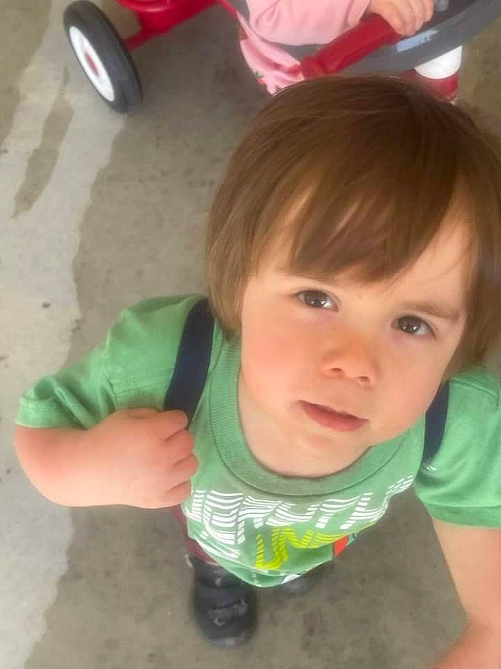 Jackson is registered to the contest to win money with this photo: baby, baby_toddler_clothing, bangs, bib, cheek, child, cool, fashion_accessory, fun, happy, mouth, neck, nose, person, play, sitting, skin, sleeve, t_shirt, thumb