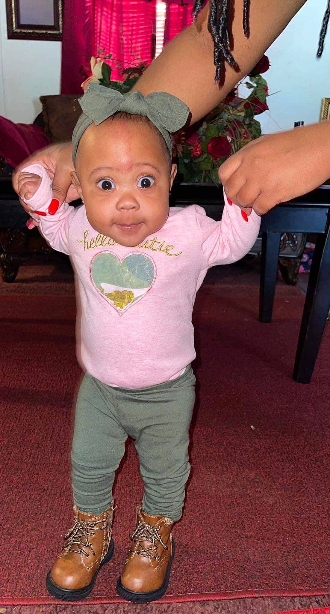 Kassidy is registered to the contest to win money with this photo: abdomen, baby, baby_products, baby_toddler_clothing, boot, bracelet, child, finger, gesture, nail, person, pink, stomach, thumb, toddler, trunk, wrist