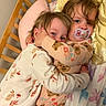 Josefina-Ravenna joined the competition — help win amazing prizes! toddler, child, hug, pajamas, bed, pacifier, blanket, sleepwear, cute, indoor, face, blue_eyes, smile, wooden_bedframe, floral_pattern, comfort, affection, sleeping_area, person, cuddling