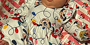 Novella joined the competition — help win amazing prizes! baby, blanket, child, christmas_lights, clothing, cute, disney, donald_duck, face, festive, holiday, indoors, infant, laying_down, mickey_mouse, minnie_mouse, pattern, person, portrait, smiling