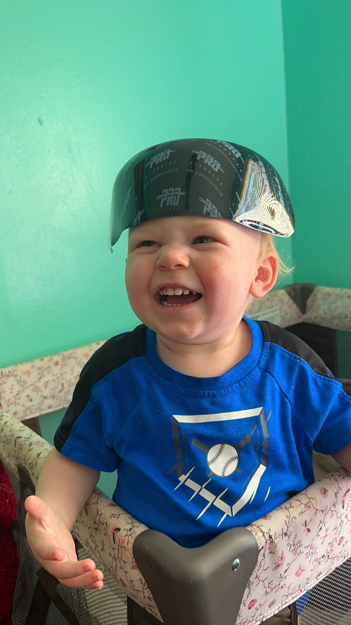 Easton is registered to the contest to win money with this photo: baby, baby_toddler_clothing, baseball_cap, cap, child, costume, costume_hat, electric_blue, event, fashion_accessory, fun, happy, hat, headgear, headwear, joy, pattern, person, personal_protective_equipment, sleeve