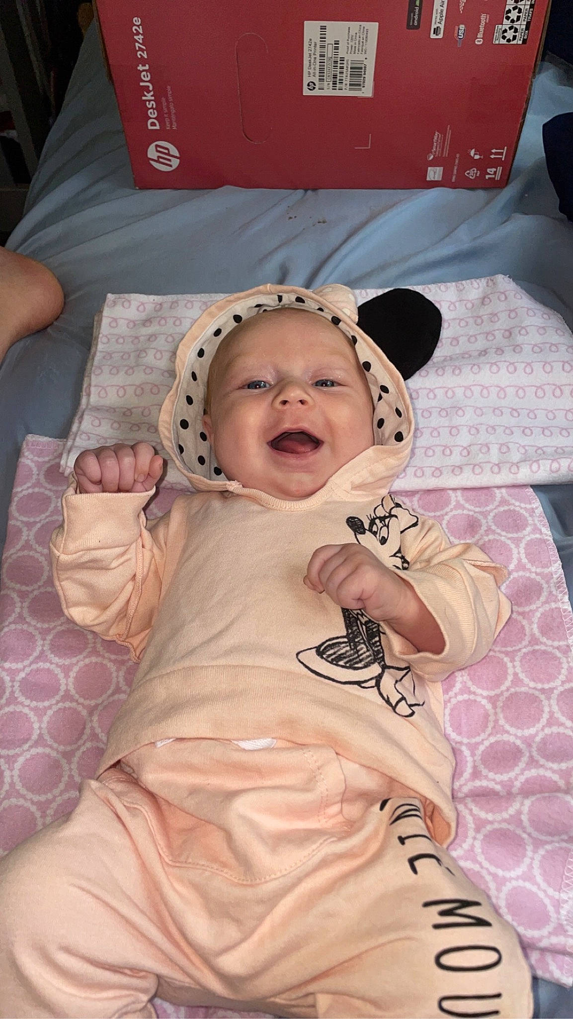 Ellie is registered to the contest to win money with this photo: baby, baby_products, baby_toddler_clothing, cheek, child, comfort, eye, fun, happy, hat, head, laugh, linens, pattern, person, pink, room, sleeve, smile, t_shirt