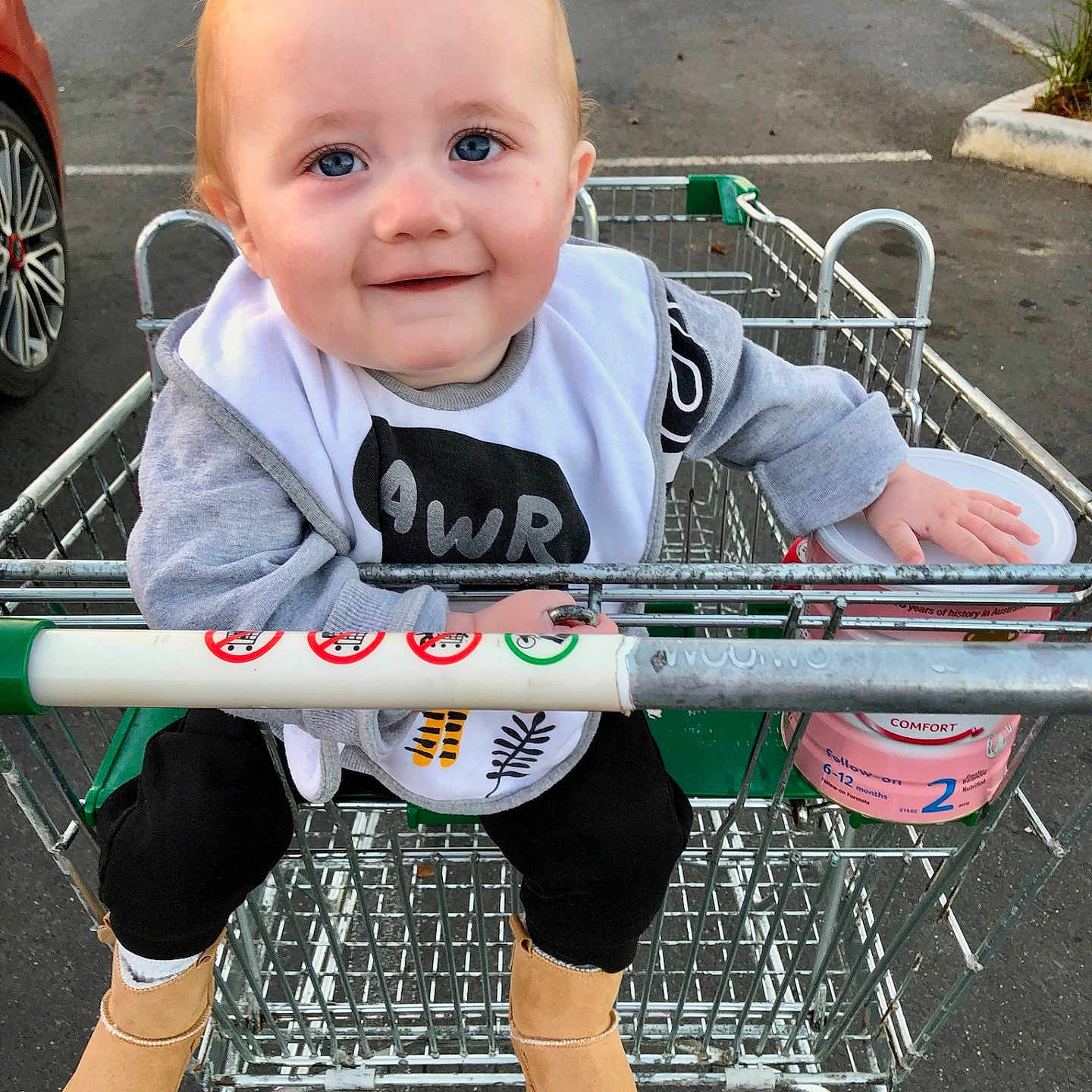 Jaxon joined the competition — help win amazing prizes! baby, car, city, clothing, face, footwear, head, machine, pants, person, photography, portrait, road, shoe, shoppingcart, street, transportation, urban, vehicle, wheel