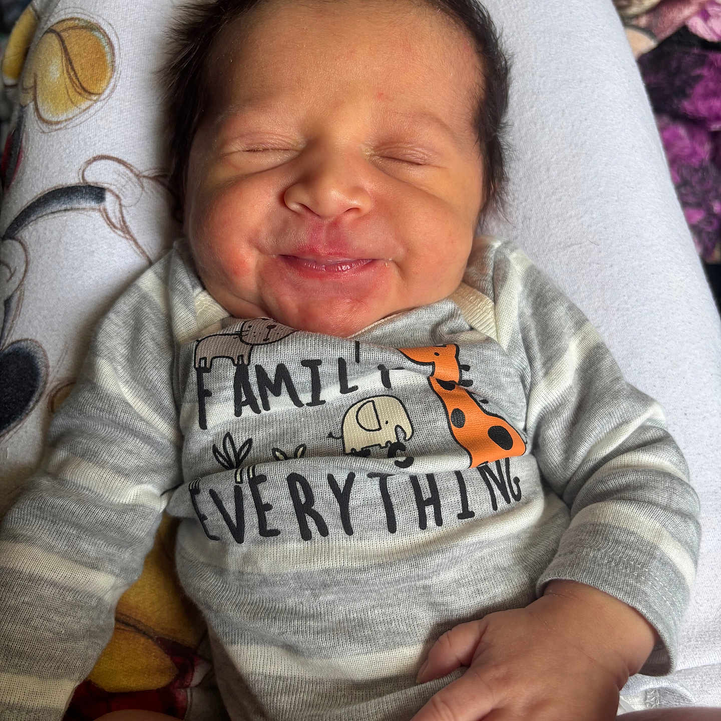 Romeo is registered to the contest to win money with this photo: baby, bodypart, clothing, cushion, face, finger, furniture, hand, happy, head, homedecor, knitwear, newborn, person, photography, portrait, sleeping, smile, sweater, t_shirt