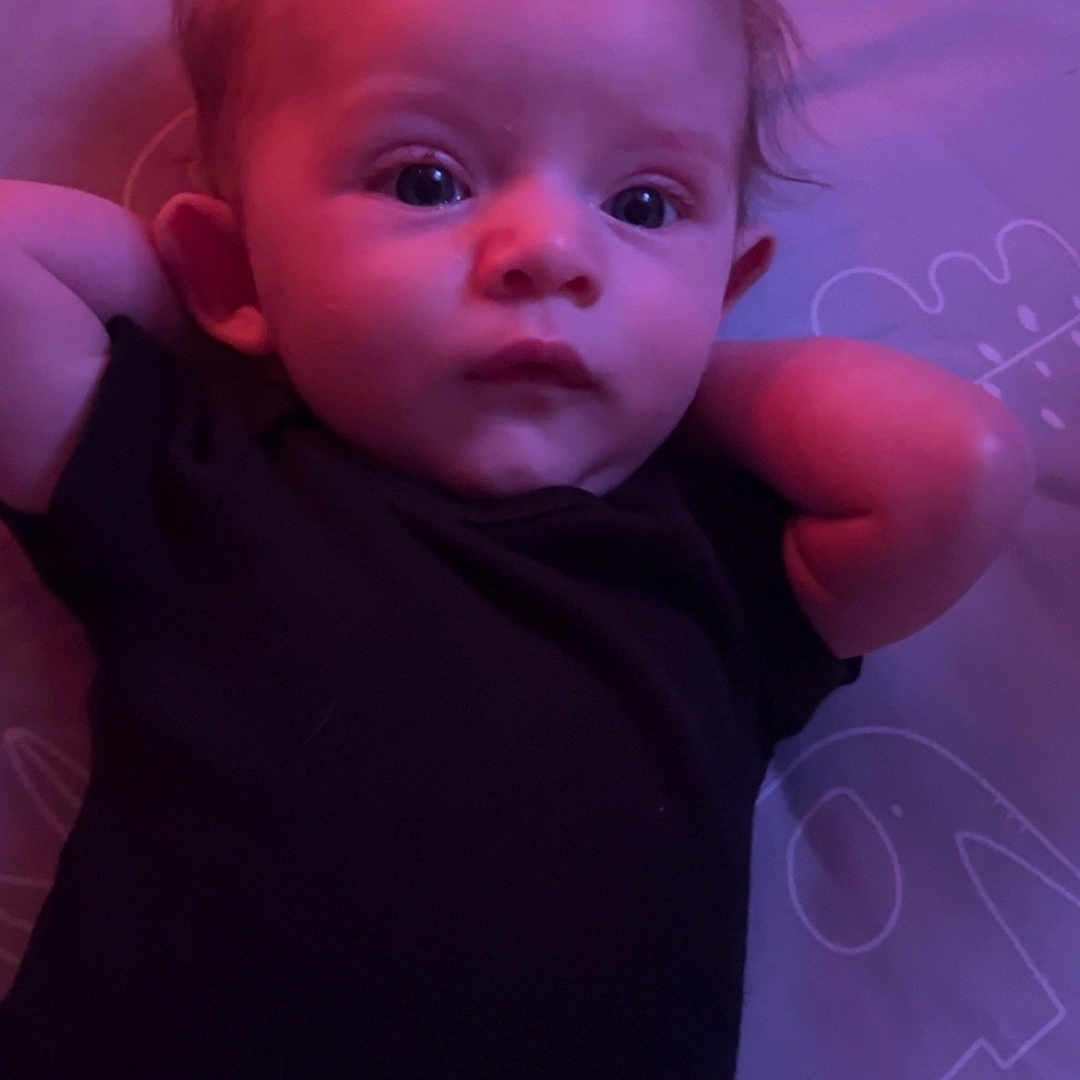 Tullaann joined the competition — help win amazing prizes! applique, baby, bodypart, clothing, face, finger, frown, hand, happy, head, mouth, newborn, pattern, person, photography, portrait, purple, sad, smile, t_shirt