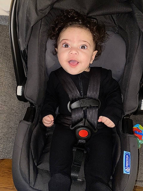 Liam joined the competition — help win amazing prizes! auto_part, baby, baby_carriage, baby_products, bag, beauty, black, car_seat, chair, child, comfort, flash_photography, head_restraint, knee, material_property, person, product, seat_belt, sitting, smile