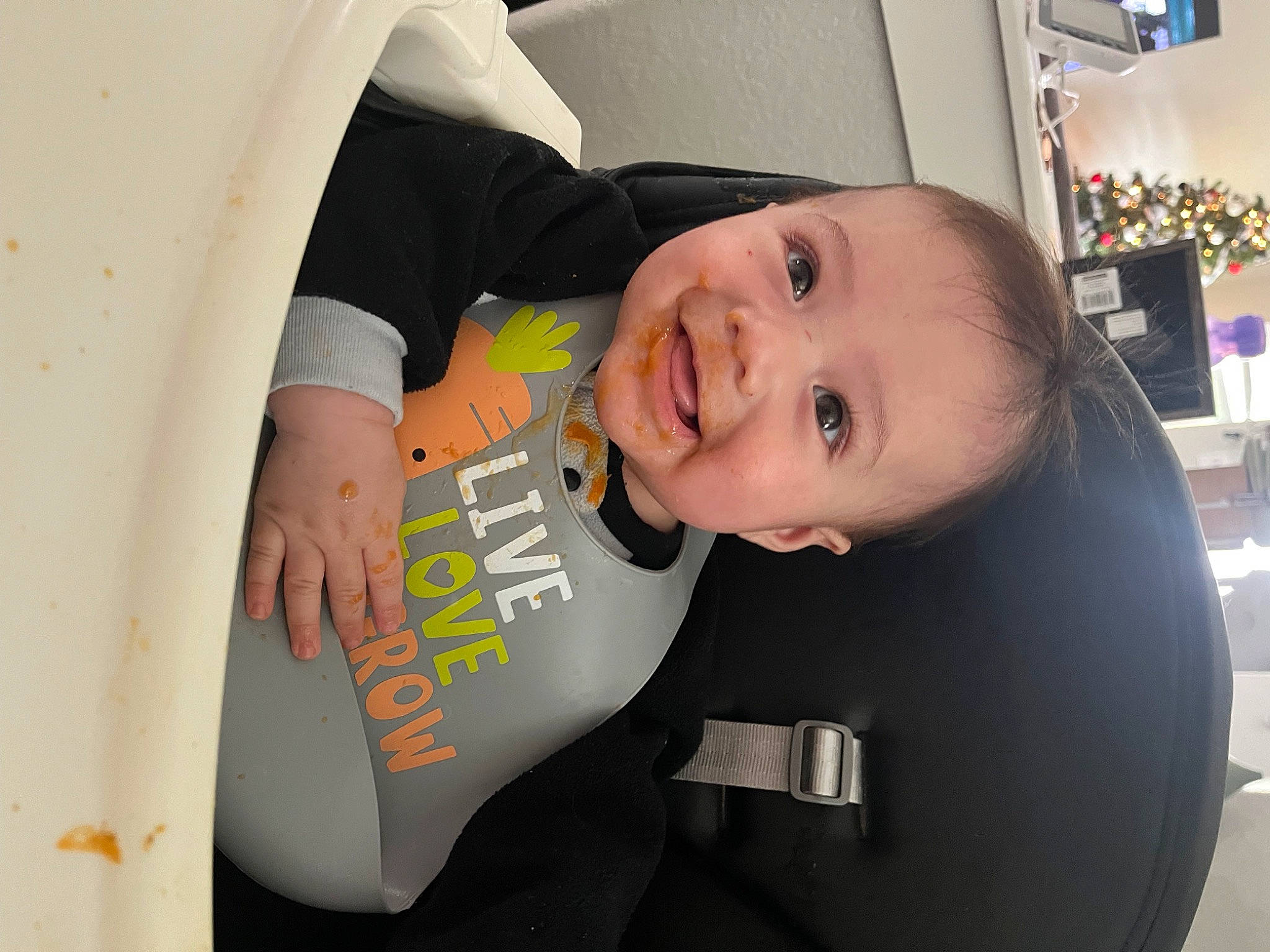 Jose is registered to the contest to win money with this photo: baby, baby_products, baby_toddler_clothing, child, comfort, eyebrow, finger, fun, happy, joy, neck, person, personal_protective_equipment, room, service, sleeve, smile, t_shirt, toddler
