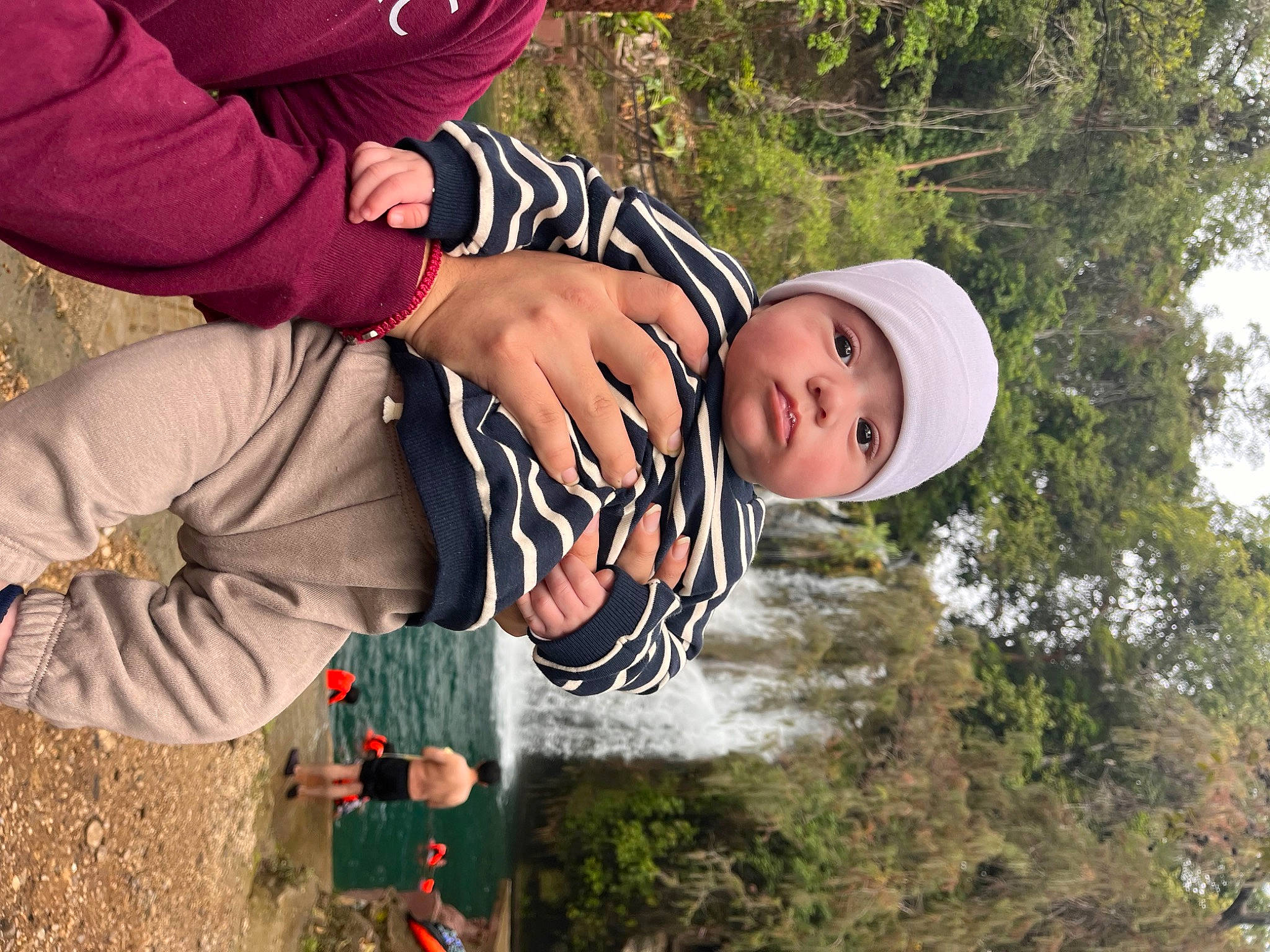 Jose is registered to the contest to win money with this photo: adventure, baby, child, fedora, fun, grass, happy, hat, headwear, landscape, leisure, people_in_nature, person, plant, recreation, soil, sun_hat, toddler, tree, winter