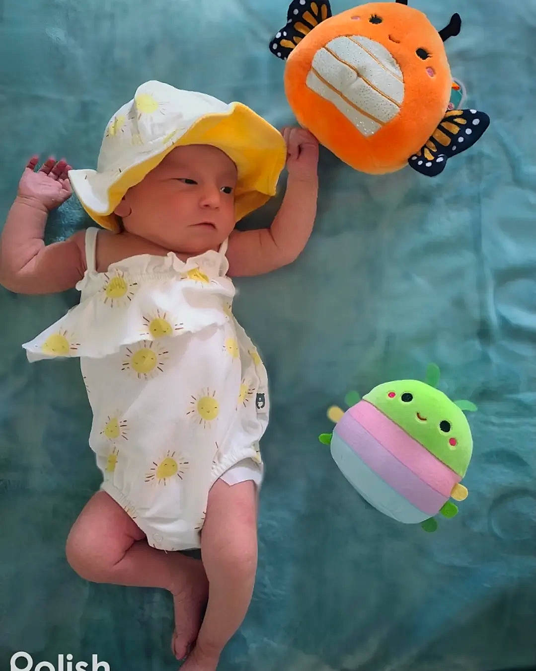 Korra is registered to the contest to win money with this photo: baby, baby_toddler_clothing, child, facial_expression, finger, fun, green, happy, headwear, leisure, organism, people_in_nature, person, photograph, pink, snapshot, stuffed_toy, toddler, vertebrate, water