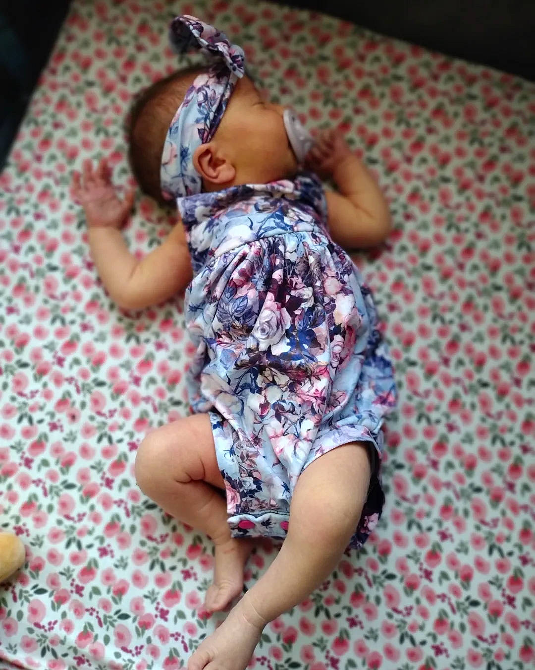 Korra is registered to the contest to win money with this photo: baby_toddler_clothing, barefoot, child, comfort, dress, finger, foot, fun, human_body, human_leg, knee, leg, leisure, magenta, pattern, person, sandal, shorts, thigh, thumb