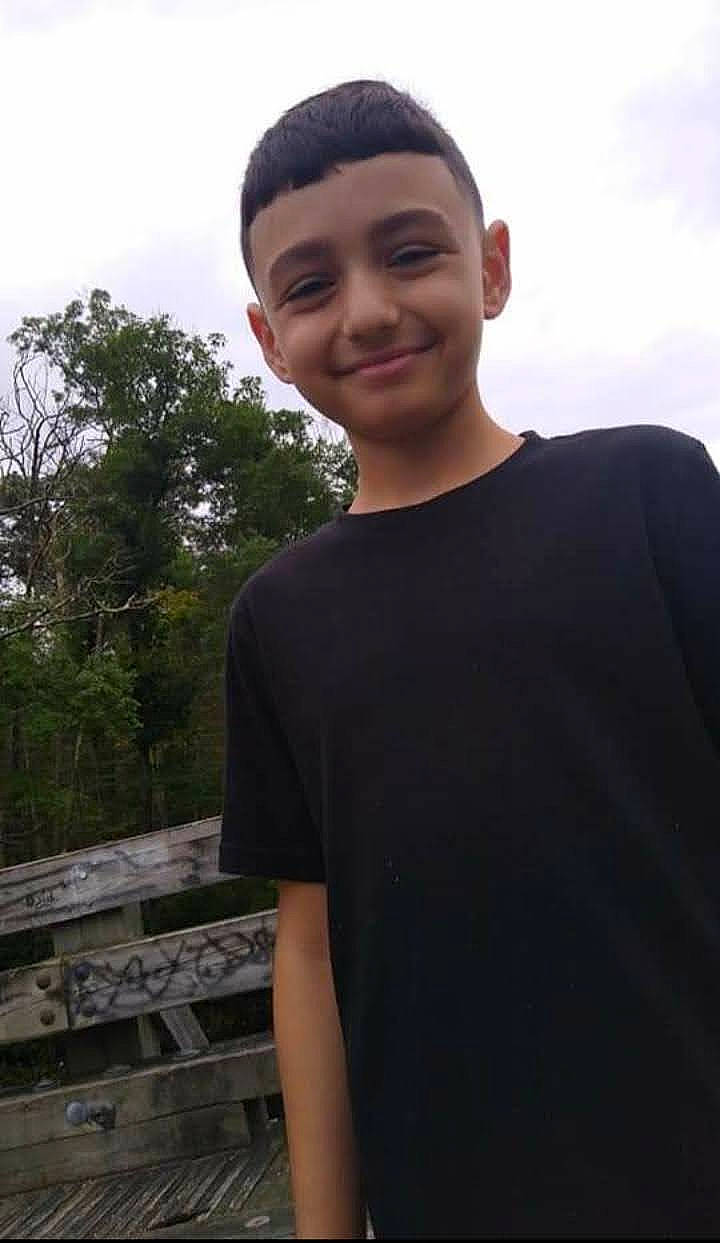 John joined the competition — help win amazing prizes! black_hair, chin, cool, eye, eyebrow, flash_photography, forehead, fun, grass, happy, head, jaw, joy, neck, person, sky, sleeve, smile, standing, t_shirt