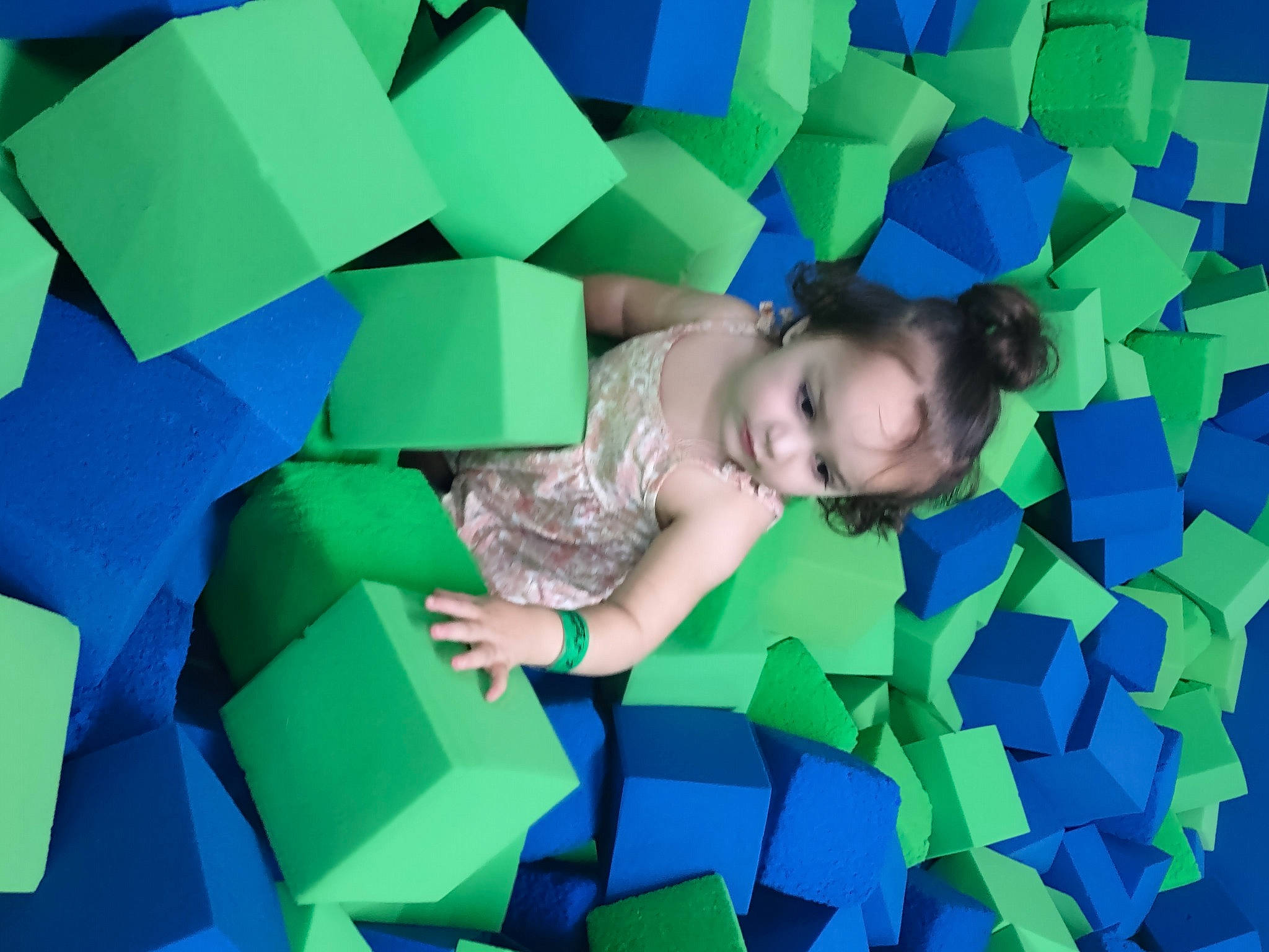 Dianne is registered to the contest to win money with this photo: aqua, art, azure, blue, child, comfort, electric_blue, flooring, fun, grass, green, leisure, pattern, people_in_nature, person, plastic, play, puzzle, rectangle, room