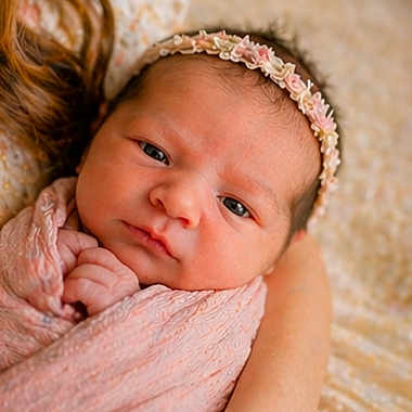 Ember is registered to the contest to win money with this photo: newborn, baby, infant, pink_blanket, headband, floral_headband, wrapped, closeup, portrait, cute, baby_face, sleepy, cozy, soft_texture, hand, skin, child, resting, warm_colors, baby_girl