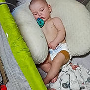 Daemon joined the competition — help win amazing prizes! baby, sleeping, pacifier, pillow, diaper, blanket, playpen, green, white, soft, child, infant, resting, indoors, cute, peaceful, napping, fabric, comfort, head