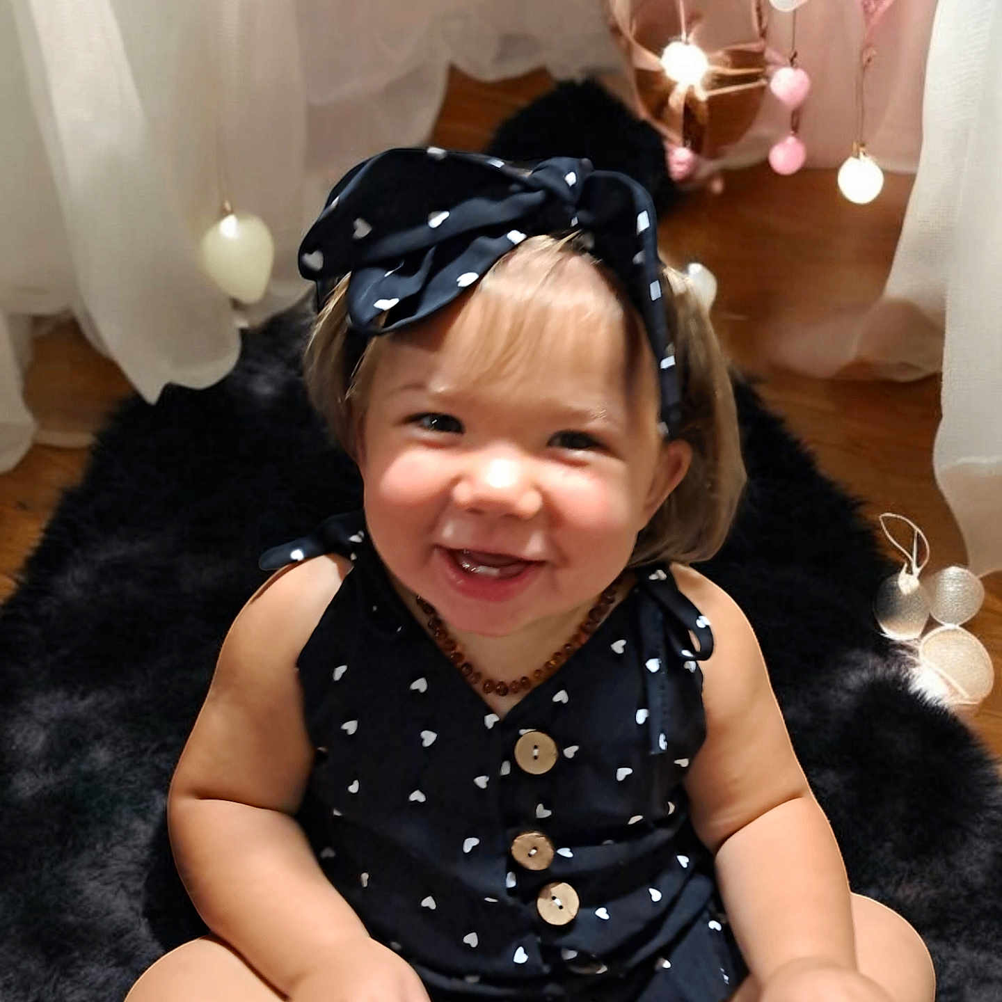 Bradlye is registered to the contest to win money with this photo: accessories, baby, babylaughing, bodypart, clothing, dress, face, finger, hand, happy, head, homedecor, jewelry, laughing, lighting, necklace, person, photography, portrait, smile
