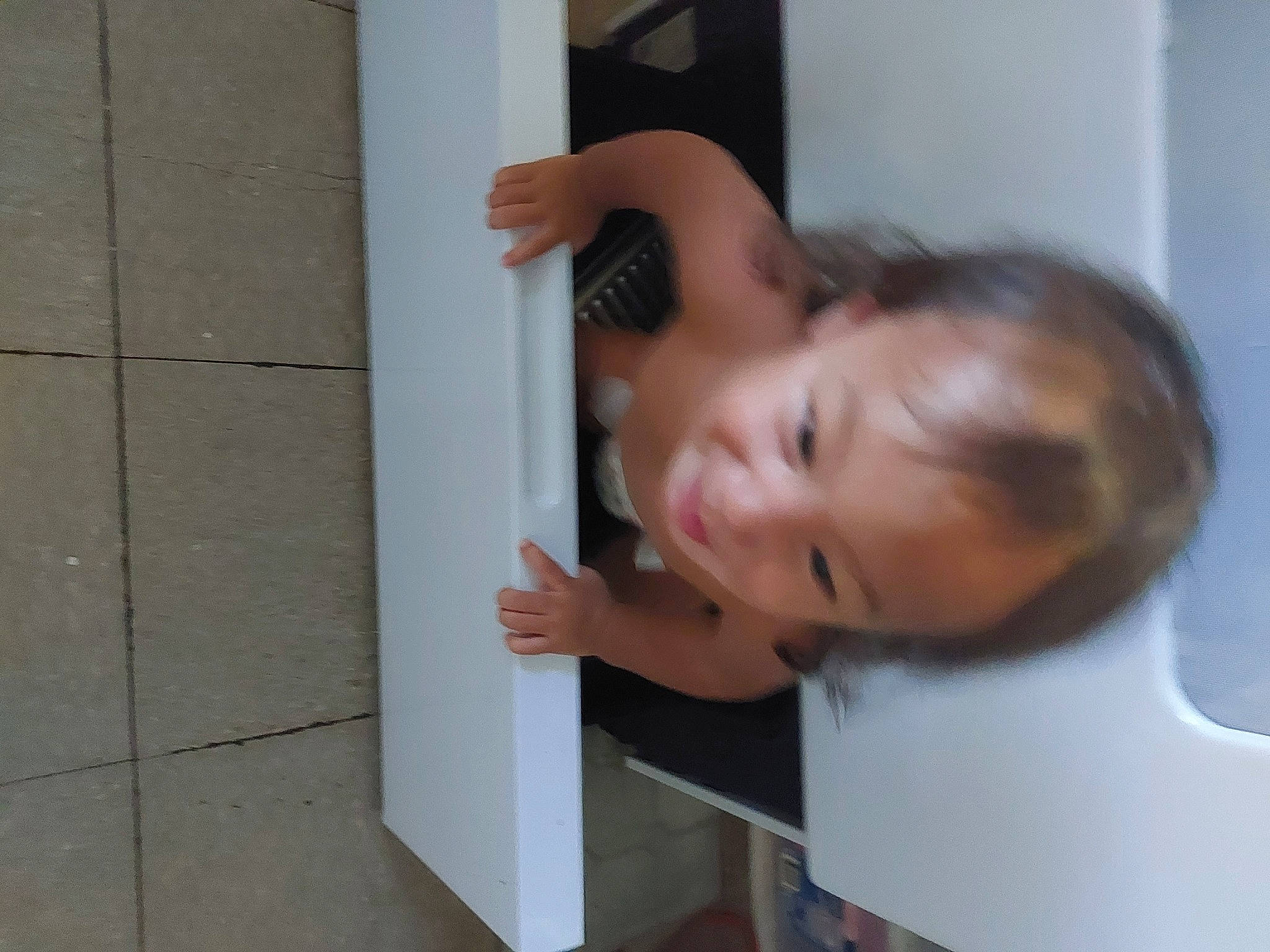 Sega is registered to the contest to win money with this photo: baby, baby_toddler_clothing, child, elbow, eyelash, finger, flooring, gesture, joy, nail, nose, person, room, thumb, toddler, window, wood, wrist