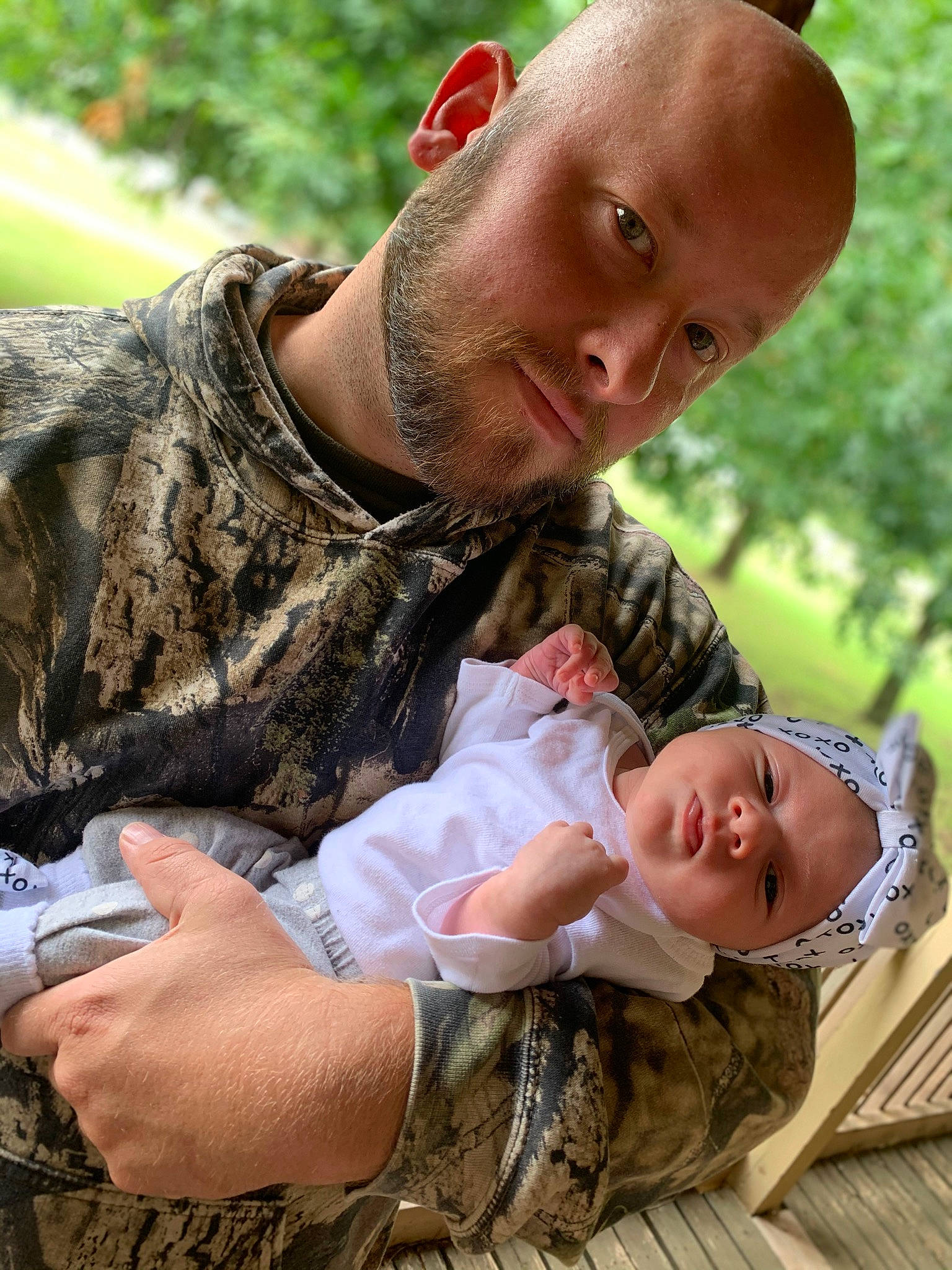 Haisley is registered to the contest to win money with this photo: baby, child, grass, headwear, military, muscle, people, person, soldier, toddler