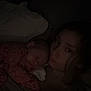 Dolly is registered to the contest to win money with this photo: baby, bedroom, blanket, bonding, child, clothing, cozy, dark, dim_light, face, indoor, infant, person, portrait, quiet, resting, sleeping, snuggling, toddler, young_person
