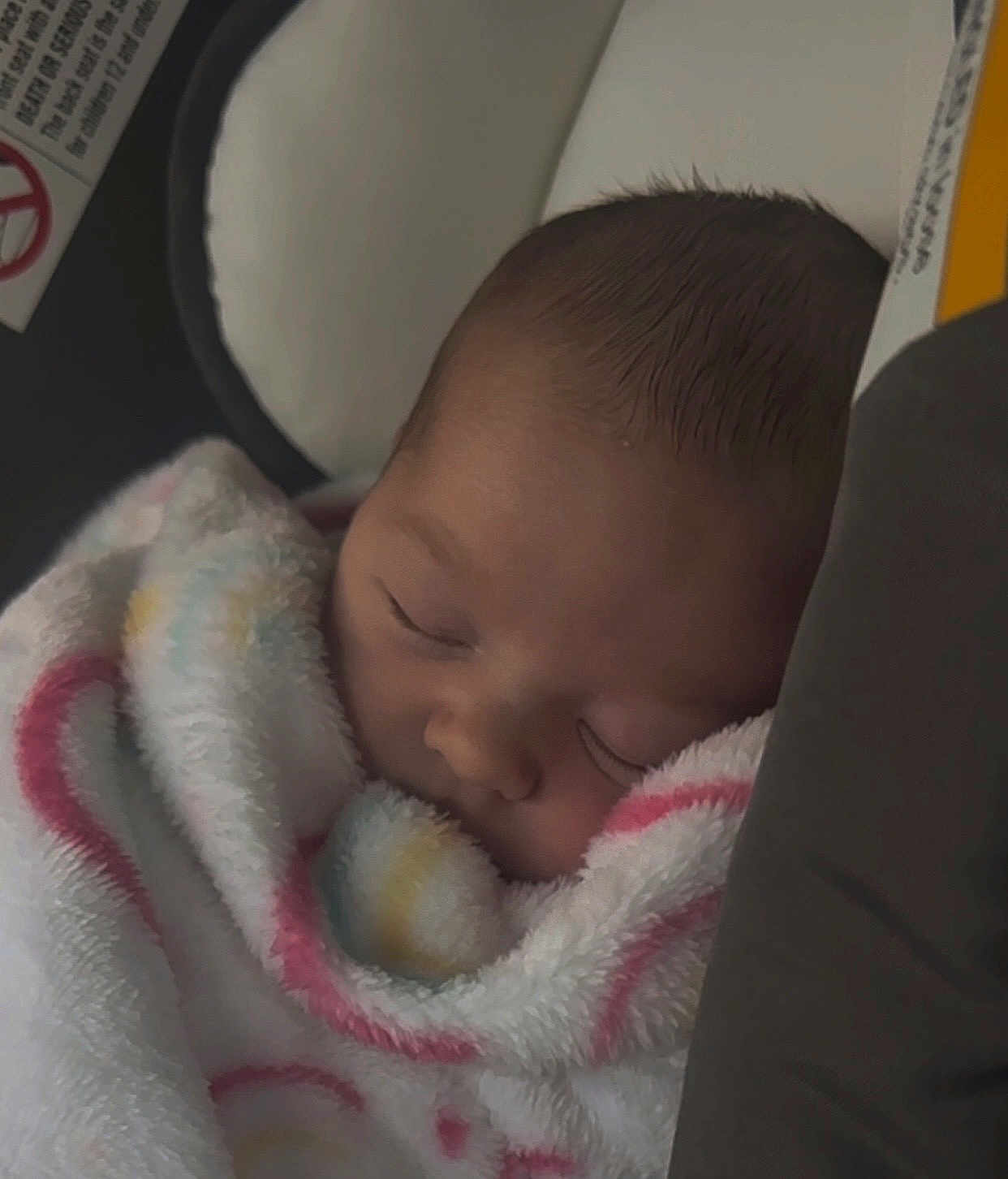 Dolly is registered to the contest to win money with this photo: baby, blanket, car_seat, child, closeup, comfort, cozy, cute, face, head, indoors, infant, newborn, peaceful, resting, sleeping, soft, toddler, warm, wrapped