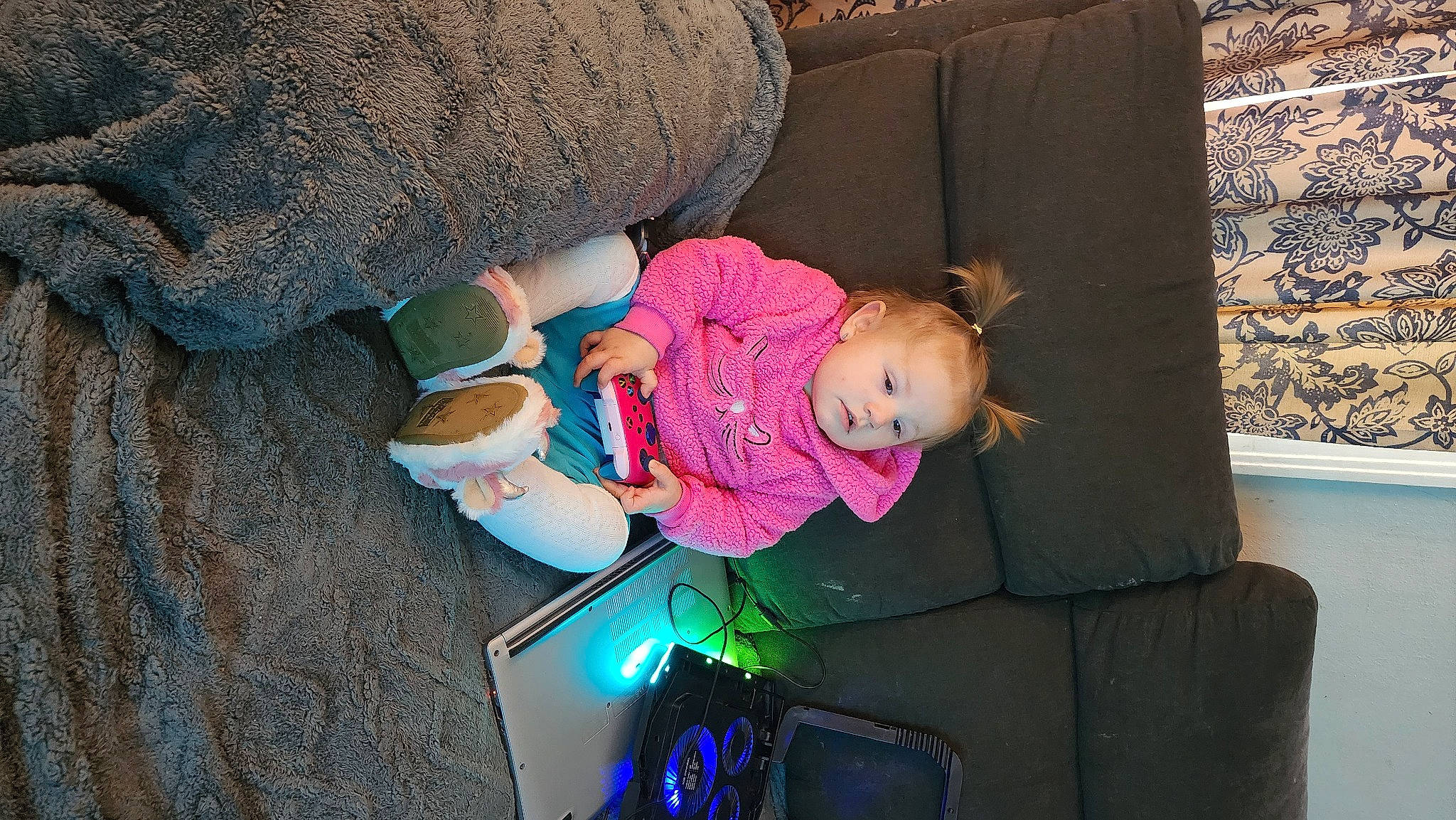 Lyra joined the competition — help win amazing prizes! baby, baby_products, baby_toddler_clothing, baby_toys, child, comfort, communication_device, couch, lap, linens, magenta, person, portable_communications_device, room, sitting, stuffed_toy, tablet_computer, toddler, toy, tree