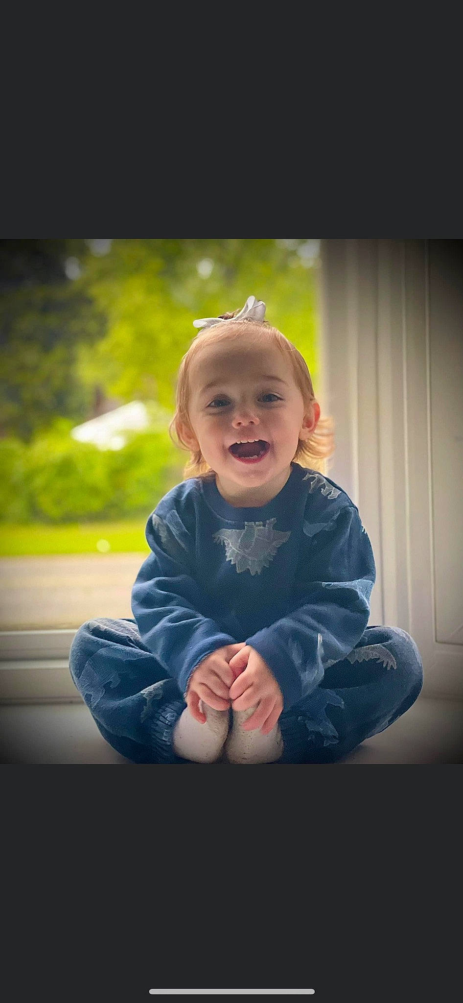 Gianna joined the competition — help win amazing prizes! arm, baby, baby_toddler_clothing, child, clothing, electric_blue, face, flash_photography, gesture, grass, happy, iris, person, sitting, sleeve, smile, standing, t_shirt, tints_and_shades, toddler