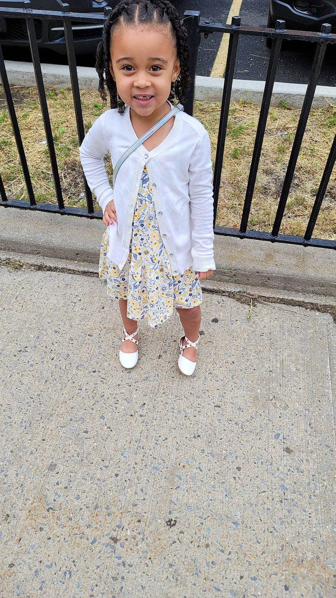 Allison is registered to the contest to win money with this photo: baby_toddler_clothing, child, cool, dress, electric_blue, fence, fun, grass, happy, head, human_leg, pattern, person, recreation, sleeve, smile, sock, street_fashion, t_shirt, toddler