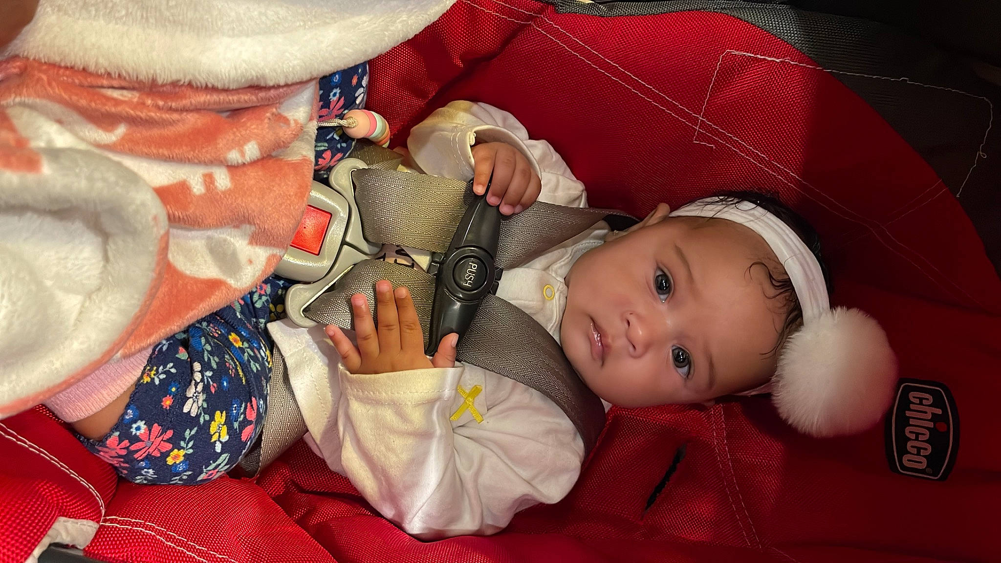 Arlene is registered to the contest to win money with this photo: arm, baby, baby_products, baby_sleeping, baby_toddler_clothing, cheek, child, comfort, eye, face, facial_expression, finger, hand, head, human_body, lap, mouth, person, red, skin