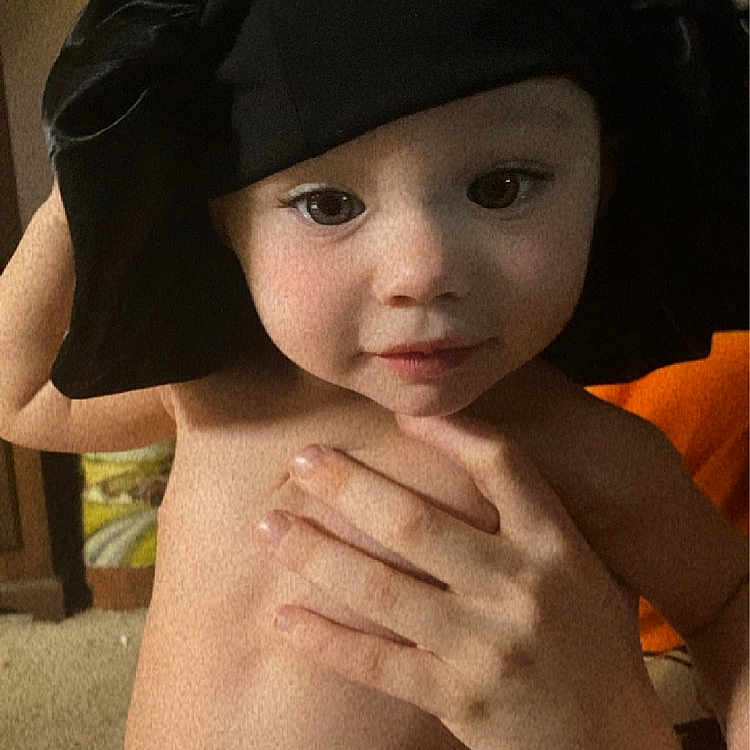 Imani joined the competition — help win amazing prizes! baby, baseballcap, bathingcap, bodypart, bonnet, cap, clothing, costume, diaper, face, finger, hand, hat, head, person, photography, portrait, shorts, sunhat, swimwear