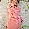 baby, swaddle, hospital_bed, medical_tubes, pacifier, headband, sensor, blanket, infant, person, medical_equipment, lying_down, cute, newborn, pink_clothing, bed, healthcare, child, face, hospital