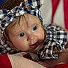 Riley joined the competition — help win amazing prizes! baby, child, headband, blue_eyes, checkered_pattern, clothing, face, flag, american_flag, red, white, blue, portrait, cute, infant, closeup, expression, innocence, soft_light, background