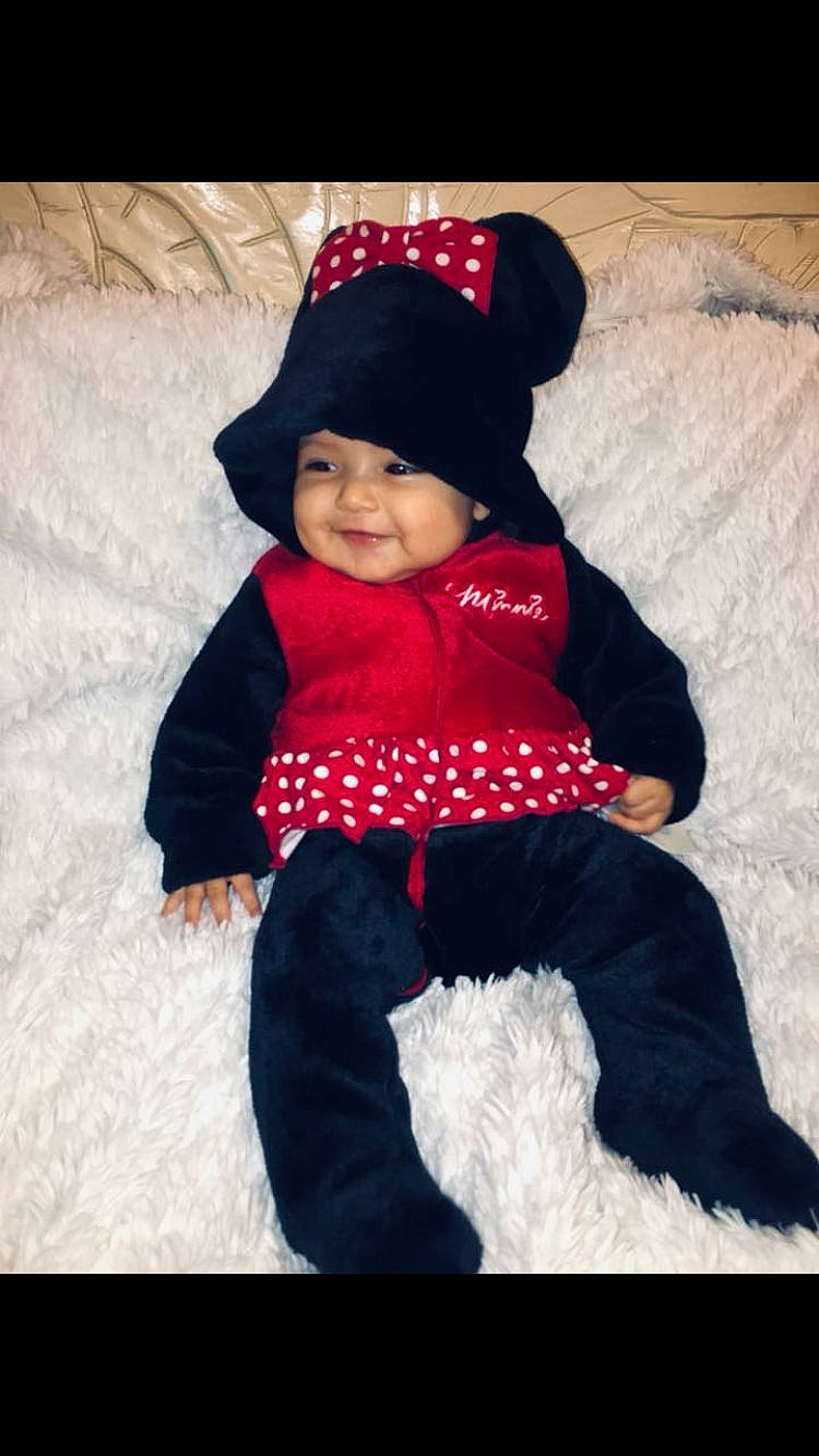 Leyla joined the competition — help win amazing prizes! beanie, cap, child, day, fun, girl, headgear, infant, joy, knit_cap, outerwear, person, product, red, skin, smile, snow, toddler, winter