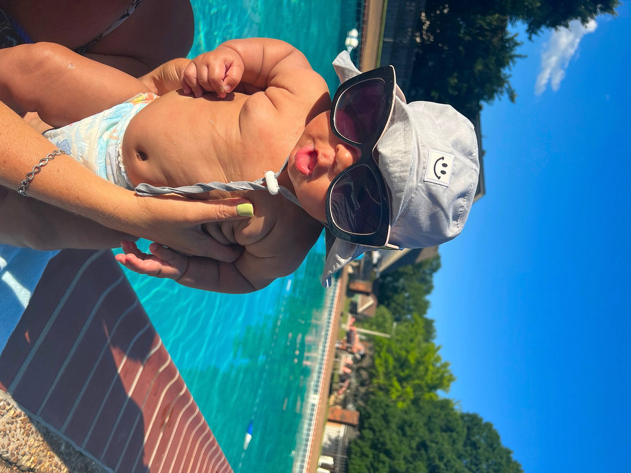 Kaycen joined the competition — help win amazing prizes! arm, chest, cool, elbow, eyewear, fun, gesture, happy, hat, head, leisure, person, recreation, shorts, sky, summer, sunglasses, swimming_pool, swimwear, tree