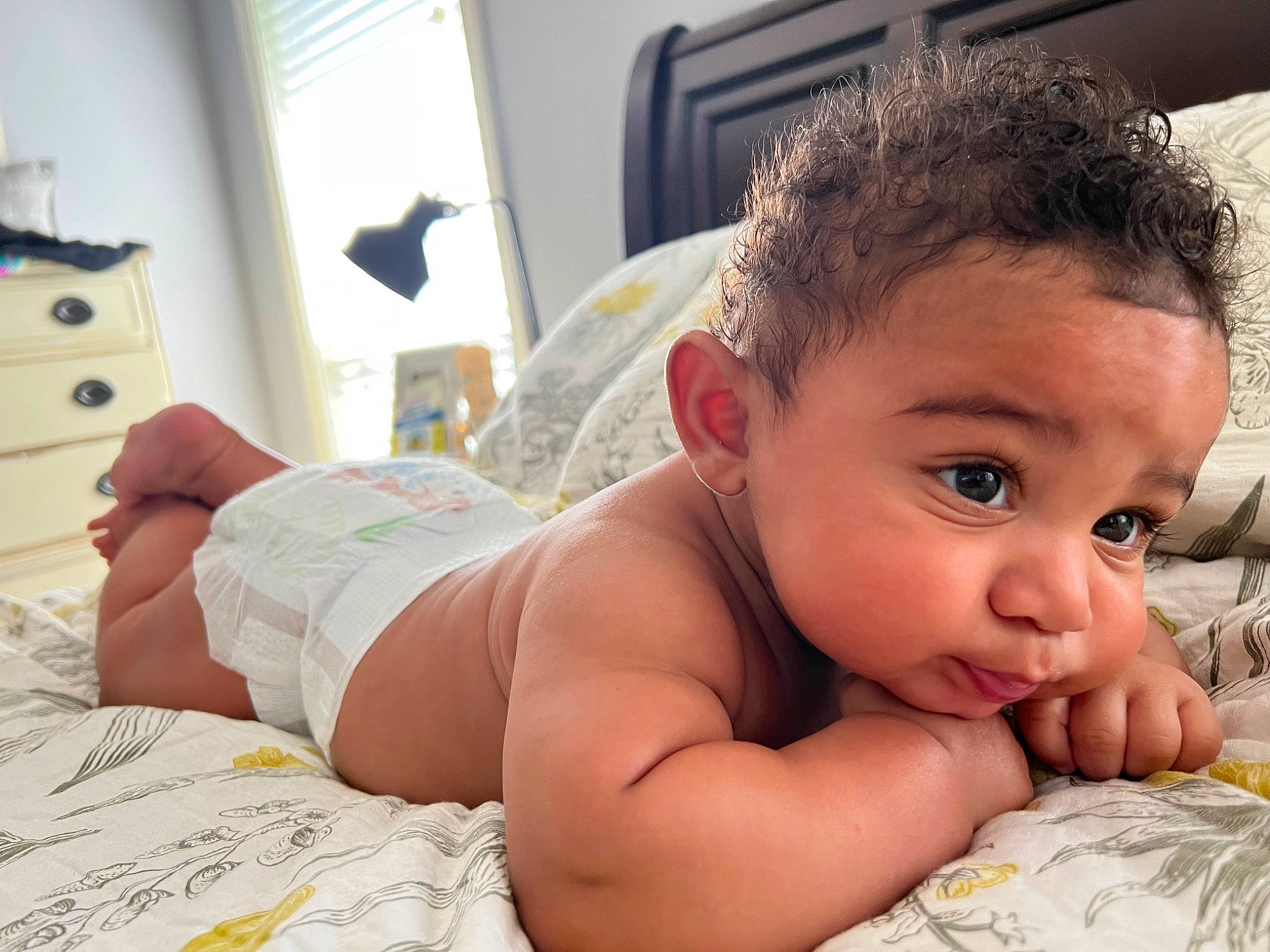 Kaycen is registered to the contest to win money with this photo: abdomen, arm, baby, cabinetry, chest, chest_of_drawers, comfort, crawling, eyelash, flooring, happy, human_body, muscle, neck, nose, person, skin, thumb, toddler, trunk