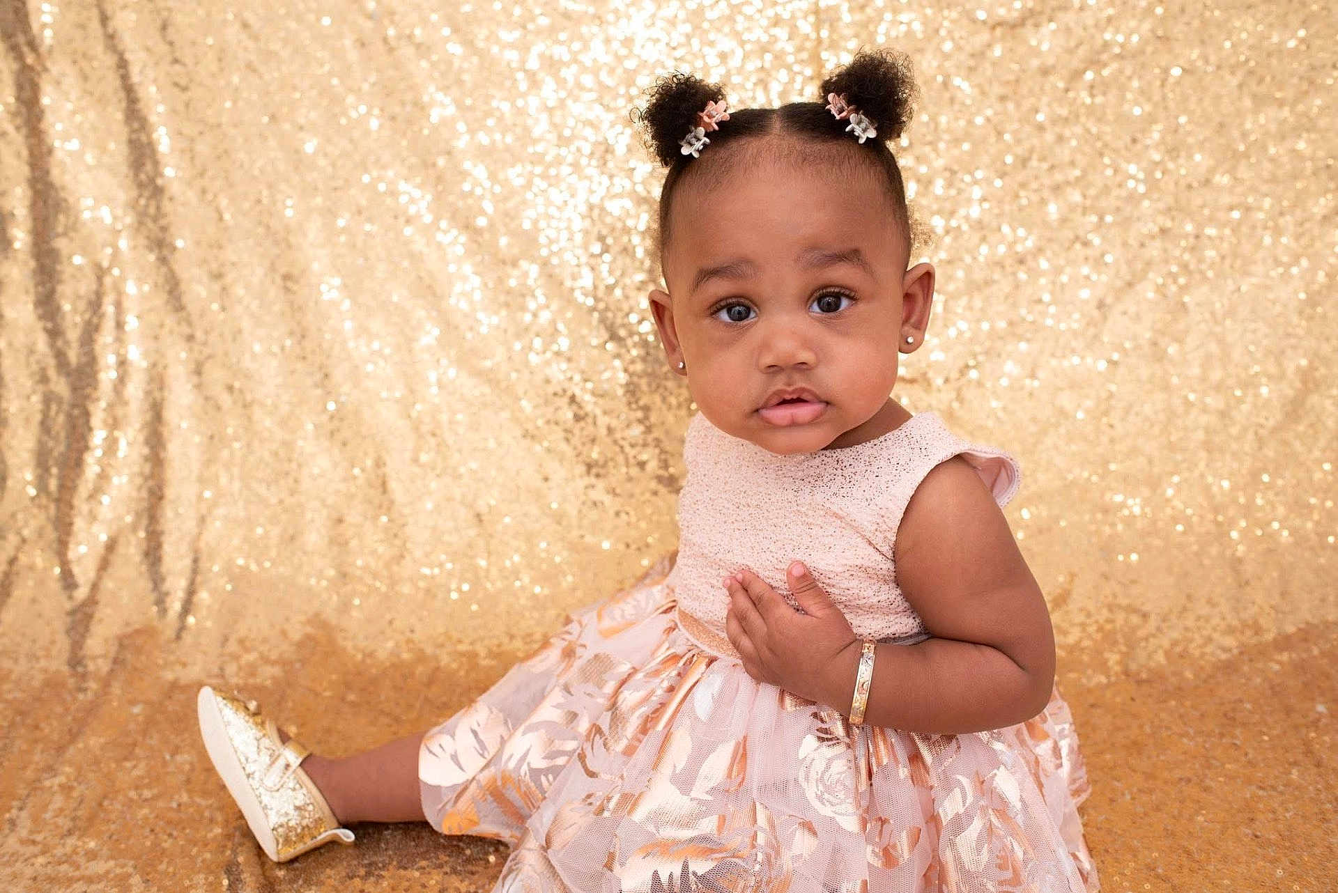 Amoura-Reign is registered to the contest to win money with this photo: toddler, child, girl, portrait, dress, flower_clips, hairstyle, bracelet, earrings, golden_shoes, sparkling_background, sitting, curious_expression, indoor, cute, fashion, young_child, studio_photo, face, person