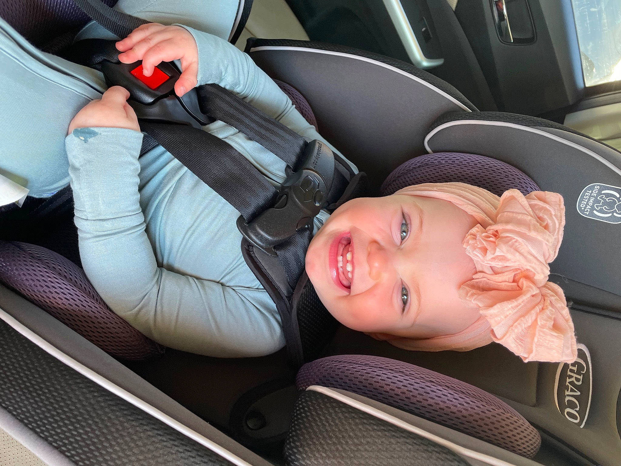 Molly joined the competition — help win amazing prizes! auto_part, automotive_design, automotive_exterior, automotive_tire, baby_in_car_seat, car, car_seat, car_seat_cover, comfort, head_restraint, headwear, joy, motor_vehicle, person, personal_luxury_car, seat_belt, smile, steering_part, steering_wheel, toddler