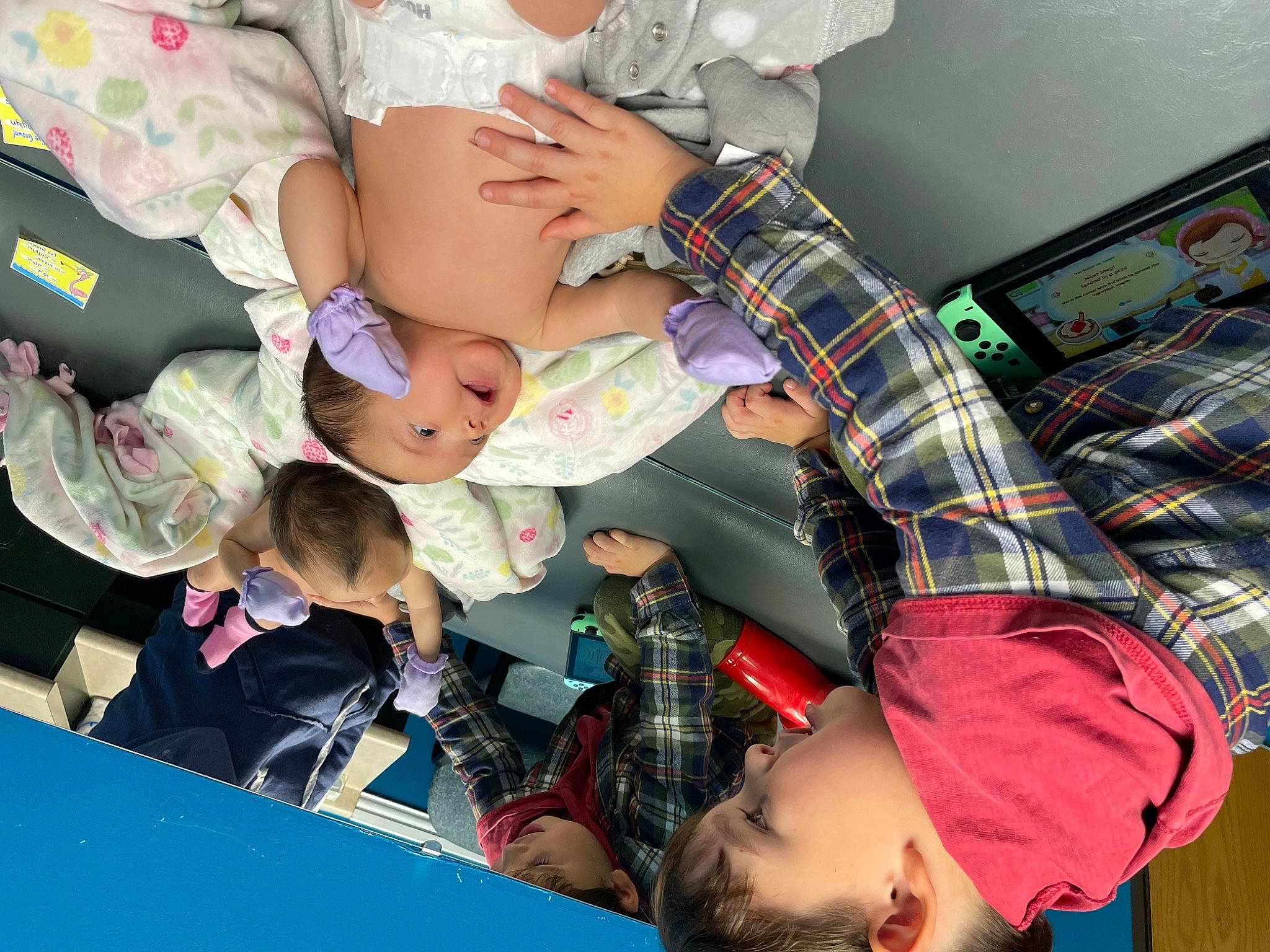 Taylyn Rose is registered to the contest to win money with this photo: baby, child, comfort, event, fashion_accessory, finger, fun, hand, happy, hat, headwear, nail, pattern, person, plaid, play, room, t_shirt, tartan, textile