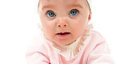 Vienna is registered to the contest to win money with this photo: baby, blue_eyes, bow_headband, child, cute, face, female, hand, headband, infant, laying_down, pink_clothing, portrait, ruffle_collar, skin, small_hands, soft_texture, white_background, white_clothing, wide_eyes