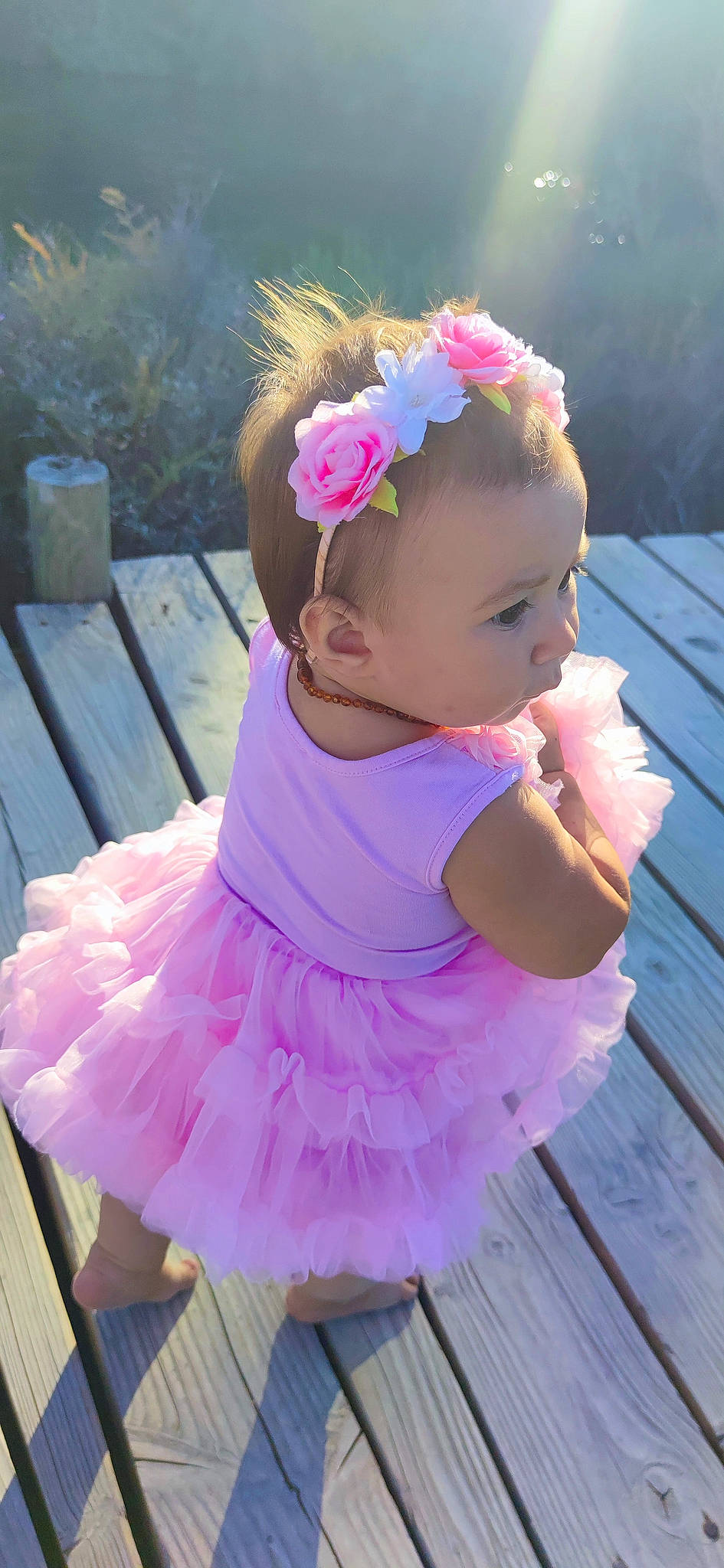 Layanna participe au concours pour gagner de l'argent avec cette photo : baby, baby_toddler_clothing, ballet_tutu, child, dress, embellishment, flash_photography, flower, grass, happy, headband, headgear, headpiece, magenta, person, petal, pink, plant, purple, toddler